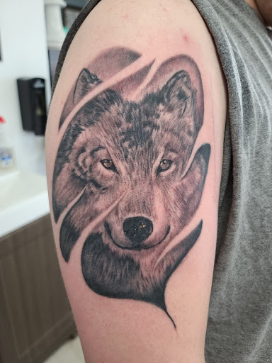 Explore dog nose tattoo ideas, creative tattoo ideas in Elko, available at Iron Anchor Tattoo