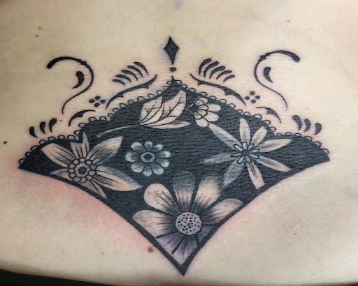 Explore inside lip tattoo ideas, creative tattoo ideas in Olney, available at Barons Ink