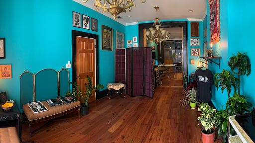 Explore cover up tattoo ideas leg, creative tattoo ideas in New Orleans, available at Lucky Dagger Tattoo