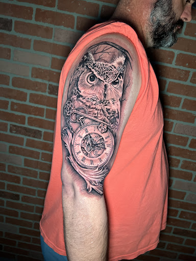Explore women's spine tattoo ideas, creative tattoo ideas in Roanoke, available at Saint Cecilias Art Studio
