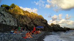 Foto von Spiaggia libera Abbelinou und die siedlung