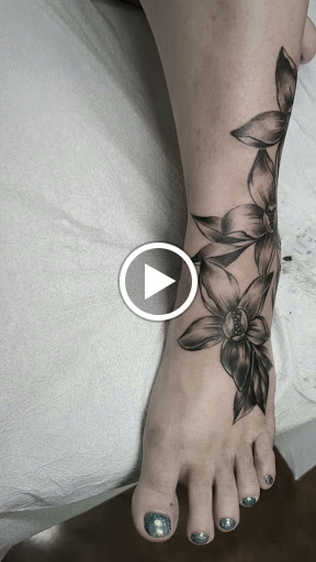 Explore sleeve tattoo idea, creative tattoo ideas in Longwood, available at Trinity Tattoo Co Inc