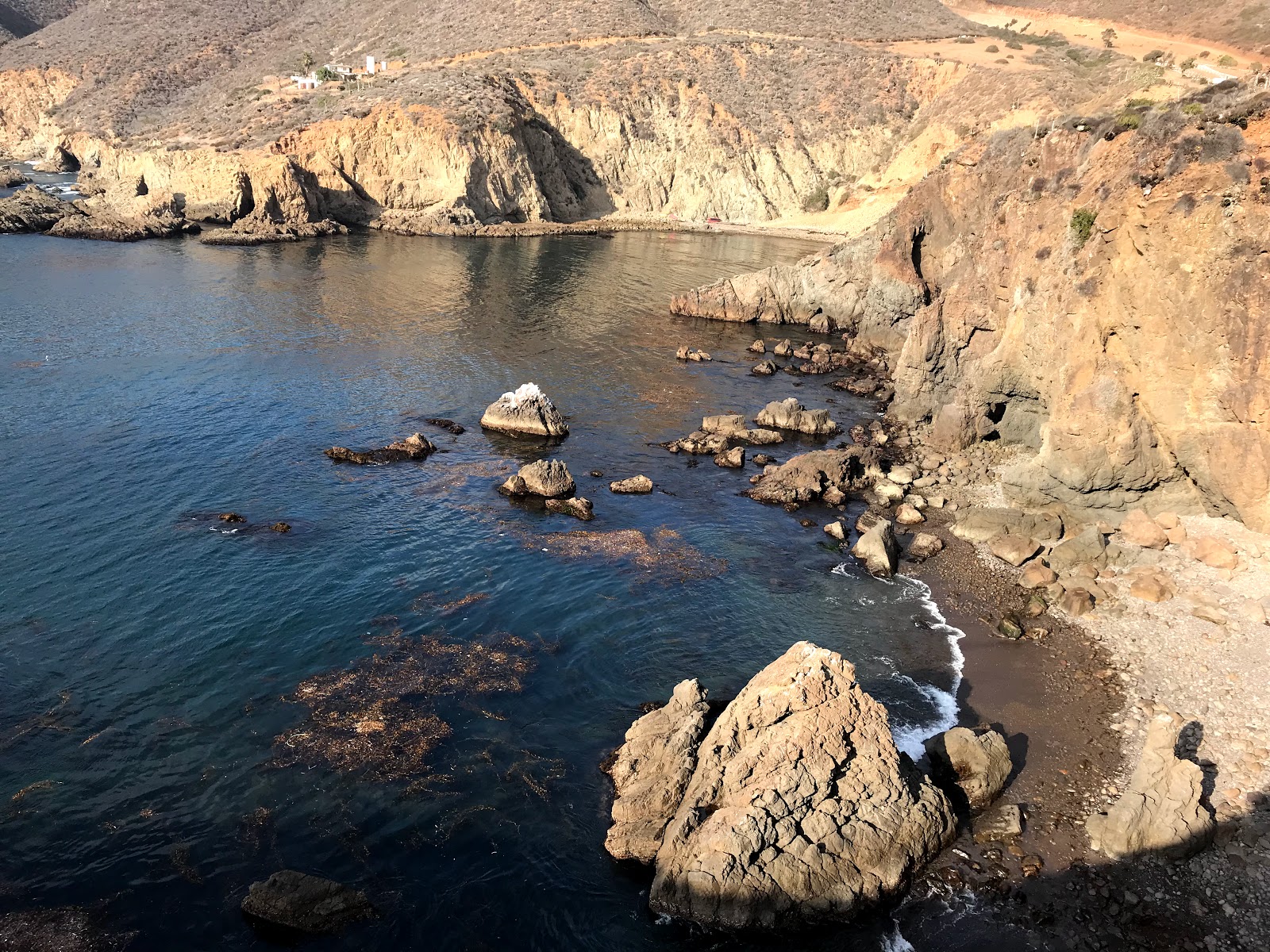 Foto av El Zepelin Beach med turkos rent vatten yta