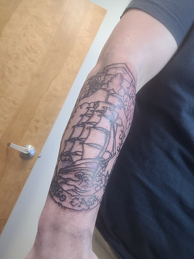 Explore throat tattoo ideas for men, creative tattoo ideas in Virginia Beach, available at Sandbridge Tattoo