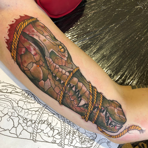 Explore weightlifting tattoos ideas, creative tattoo ideas in Savannah, available at tattoos by delan