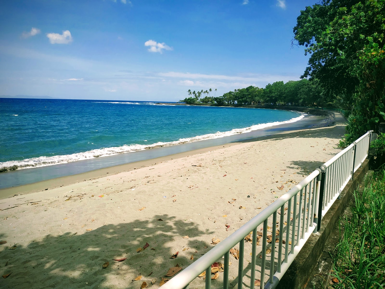 Photo of Senggigi Beach II with bright sand surface