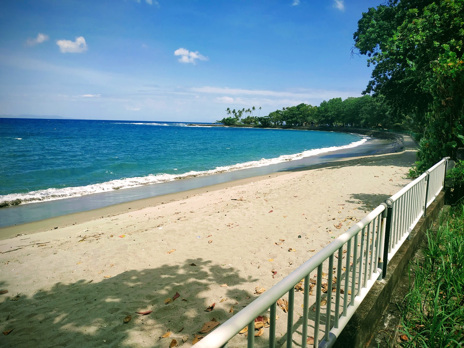 Foto de Senggigi Beach II con arena beige superficie