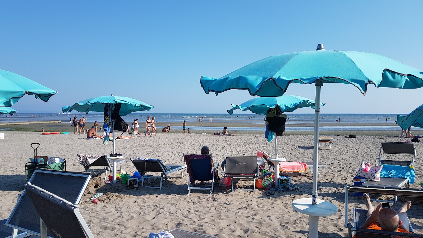 Spiaggia Grado Pineta'in fotoğrafı - rahatlamayı sevenler arasında popüler bir yer