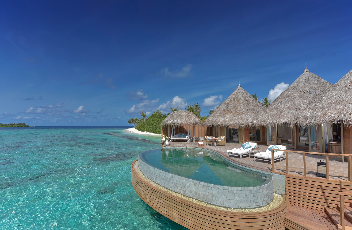 Thiladhoo Adası Plajı'in fotoğrafı - rahatlamayı sevenler arasında popüler bir yer