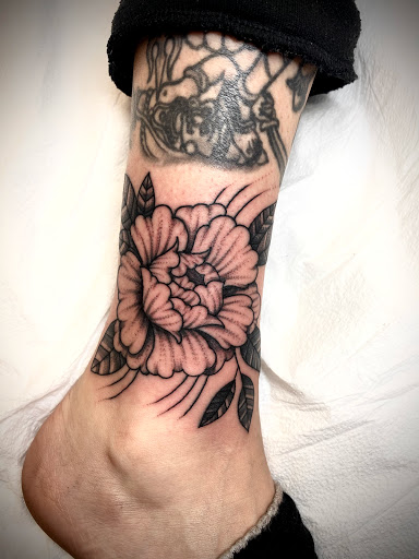 Explore tattoo station ideas, creative tattoo ideas in New Orleans, available at TOUGH LOVE TATTOOS