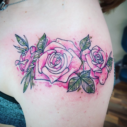 Explore tombstone movie tattoo ideas, creative tattoo ideas in Kenosha, available at Kenosha Tattoo Company