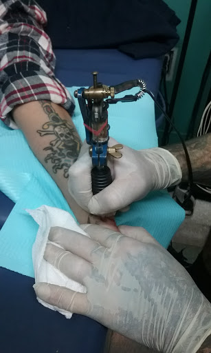 Explore arm flower tattoo ideas, creative tattoo ideas in Satellite Beach, available at Rocksteady Tattoo Company