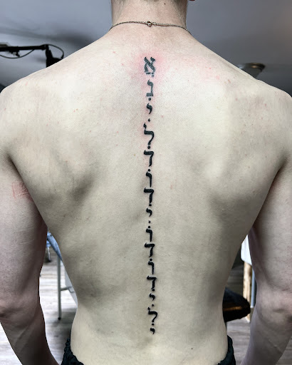 Explore pregnancy loss tattoo ideas, creative tattoo ideas in Ozark, available at ChrisPeckTattoos