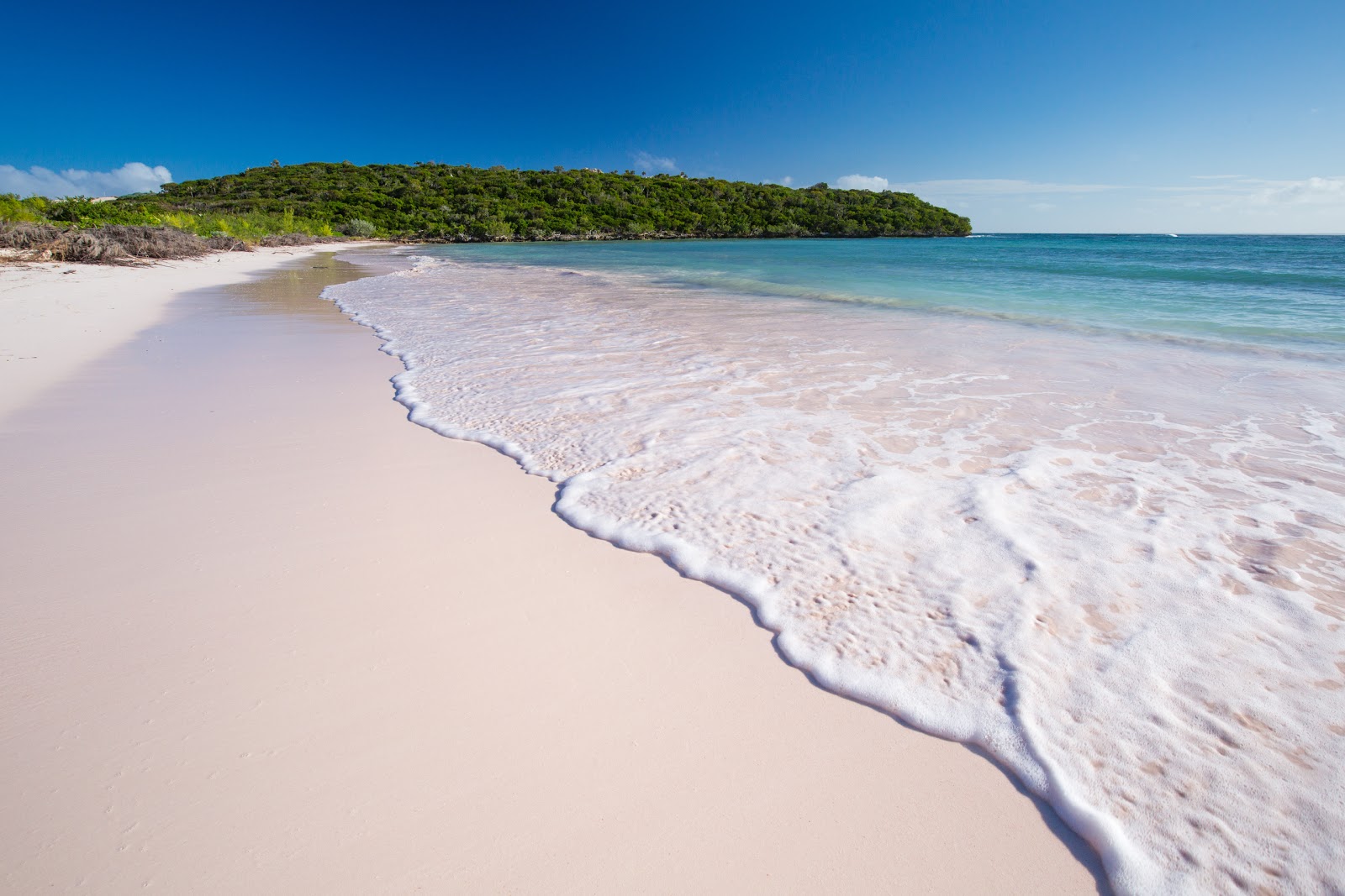 Foto von Cotton Bay beach mit heller feiner sand Oberfläche