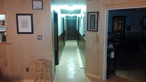 Tattoo Shop «magnum opus tattoo company», reviews and photos, 1817 Padre Blvd #4, South Padre Island, TX 78597, USA