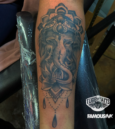 Explore matching cat tattoo ideas, creative tattoo ideas in Hammond, available at Famous Ink, Inc.