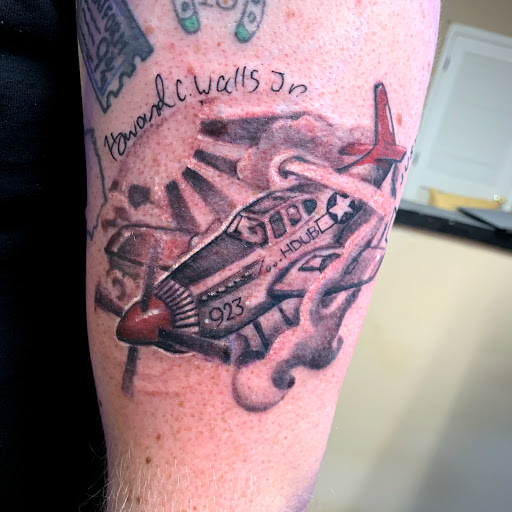 Explore back shoulder tattoo ideas for men, creative tattoo ideas in Augusta, available at Mr. Tattoo