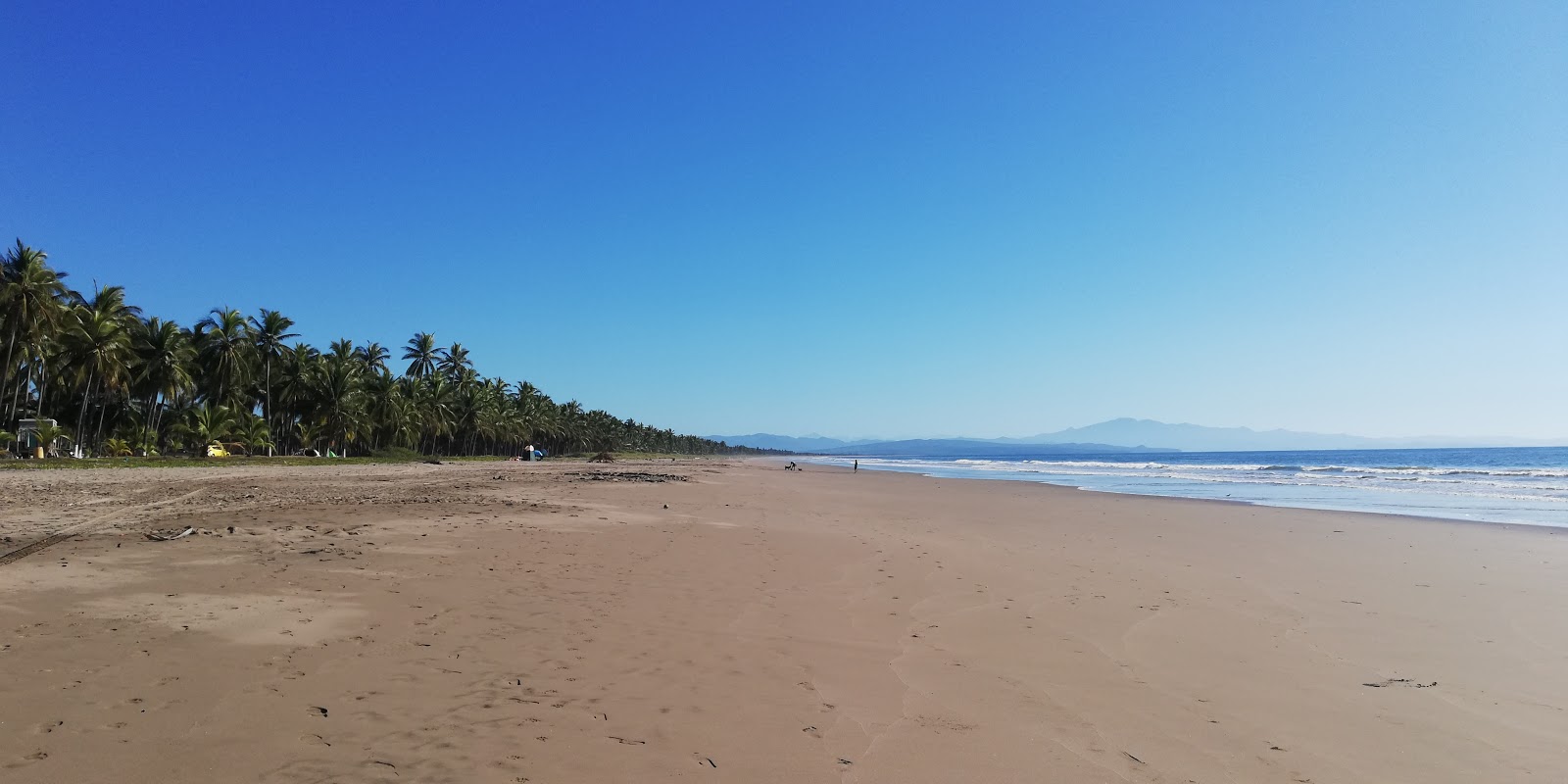 Foto de Chila beach com meios de comunicação nível de limpeza