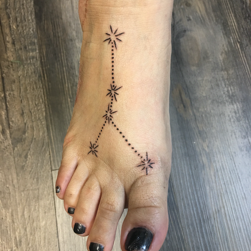 Explore bow hunting tattoo ideas, creative tattoo ideas in Warner Robins, available at Untold Pain Tattoo Studio