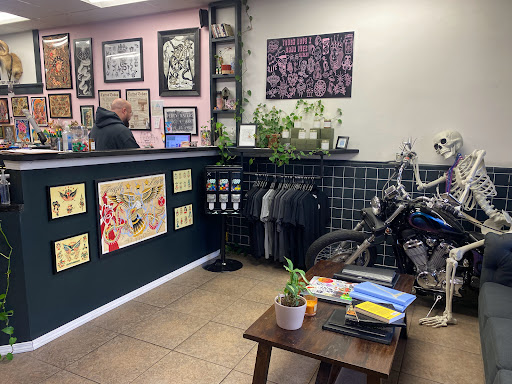 Explore dragon tattoo cover up ideas, creative tattoo ideas in New Orleans, available at TOUGH LOVE TATTOOS