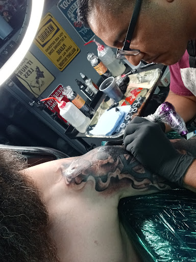 Explore black sleeve tattoo ideas, creative tattoo ideas in Loveland, available at Single Needle Tattoo