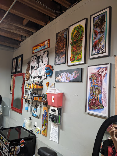 Explore female thigh tattoo ideas, creative tattoo ideas in Colorado Springs, available at Fallen Heroes Tattoo & Piercing (Colorado)