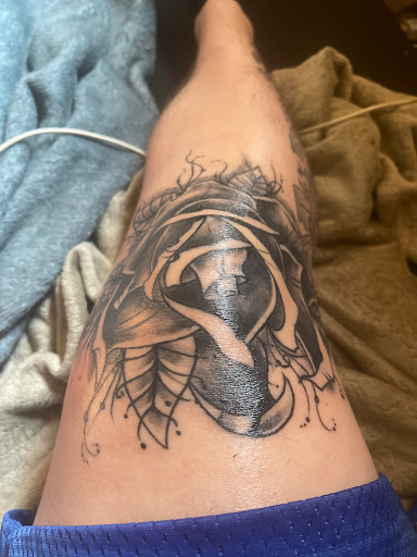Explore sunflower and butterfly tattoo ideas, creative tattoo ideas in Slippery Rock, available at Dinky Dachshund Tattoo Parlor