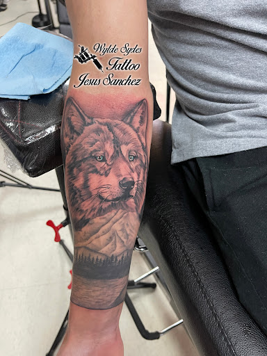 Explore forearm christian tattoo ideas, creative tattoo ideas in San Diego, available at Wylde Sydes Tattoo & Body Piercing