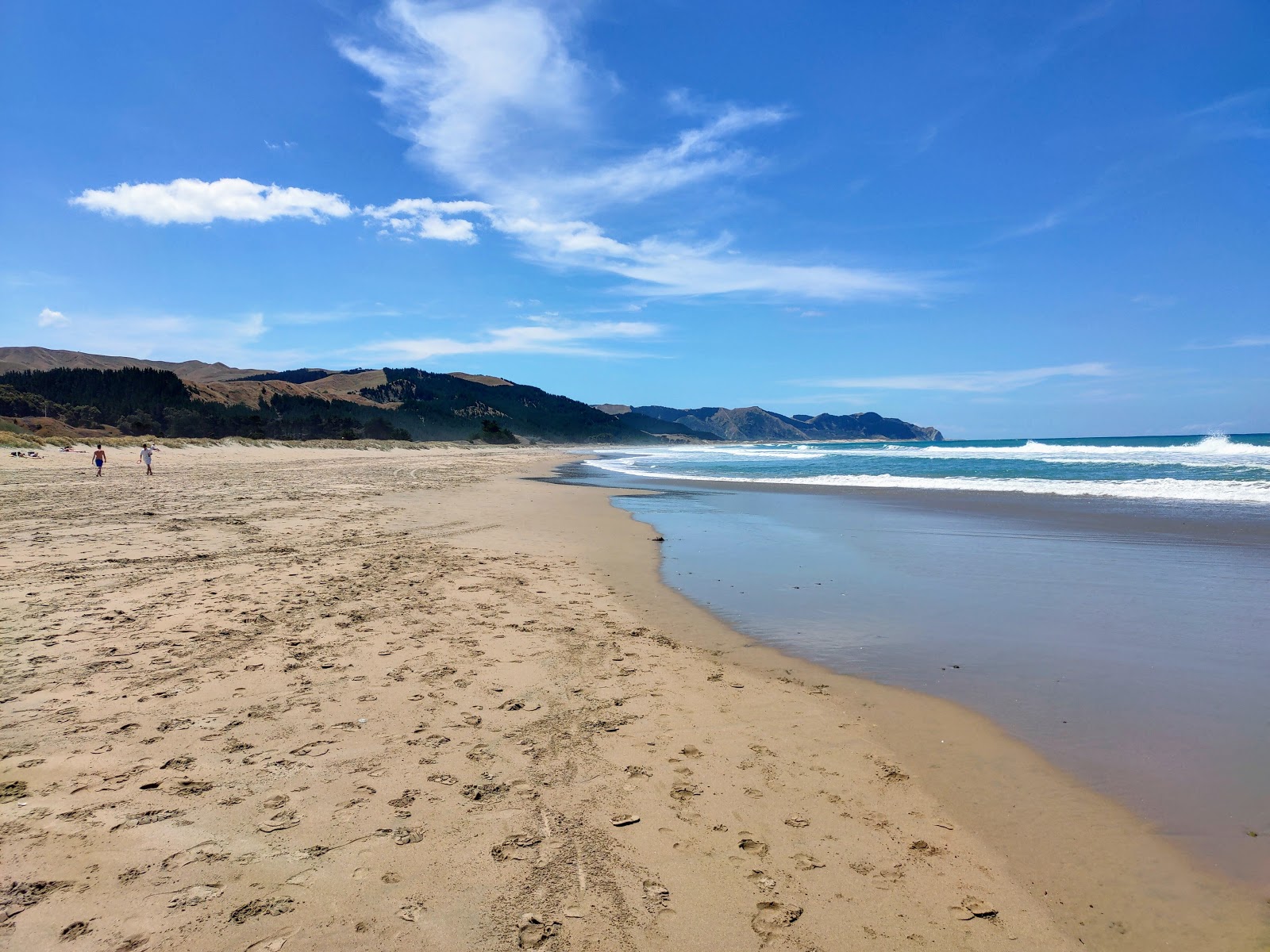 Ocean Beach的照片 带有明亮的沙子表面