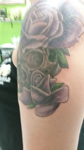Find in between breast tattoo ideas for your next unique tattoo in Walla Walla at Tatmandu