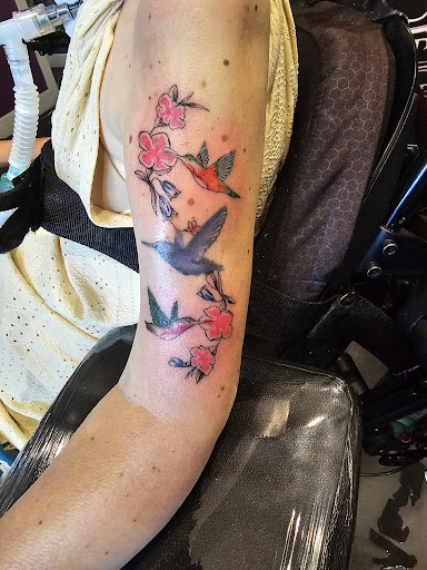 Explore cute thigh tattoo ideas, creative tattoo ideas in Denver, available at Nocturnal Tattoo