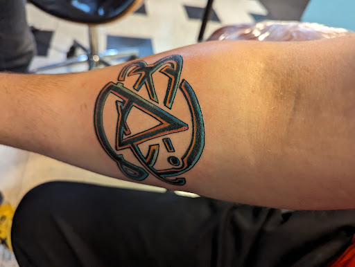 Explore wildflower tattoo ideas, creative tattoo ideas in Milwaukee, available at Cornerstone Tattoo