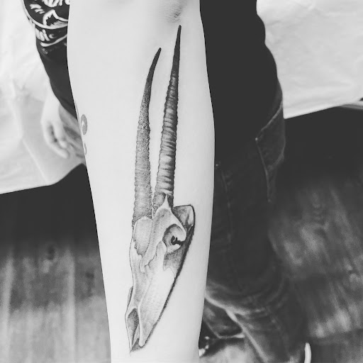 Explore world tattoo ideas, creative tattoo ideas in Virginia Beach, available at Whiskey River Tattoo