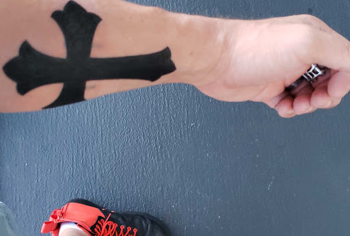 Explore word finger tattoo ideas, creative tattoo ideas in Saint Petersburg, available at Ink Godz Tattoos