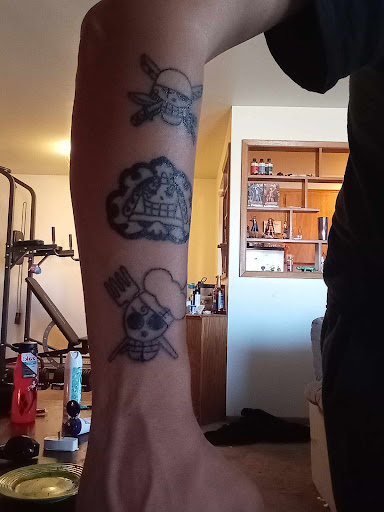 Explore tombstone movie tattoo ideas, creative tattoo ideas in Spokane, available at All About It Tattoo Studio