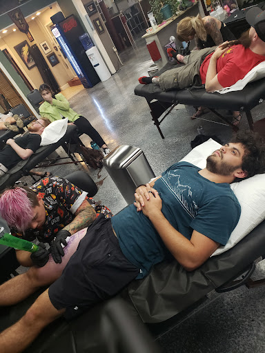 Explore female full sleeve tattoo ideas, creative tattoo ideas in Rockford, available at Delicious Ink Tattoo & Piercing