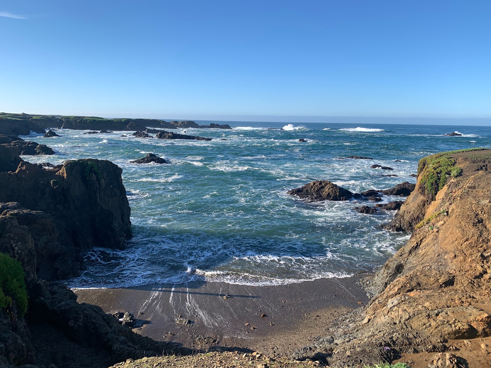 Photo of Glass Beach and the settlement