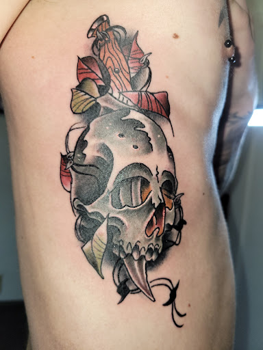 Explore ideas for elbow tattoos, creative tattoo ideas in Angola, available at Hoodlum Ink