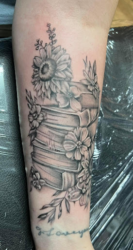 Explore wrist wrap tattoo ideas, creative tattoo ideas in Warner Robins, available at Untold Pain Tattoo Studio