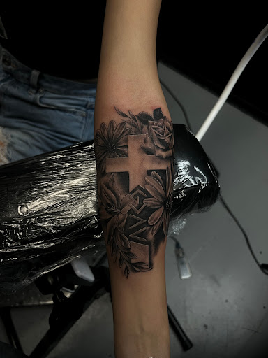 Explore lower arm tattoos ideas for guys, creative tattoo ideas in Mcallen, available at House of Tattoos