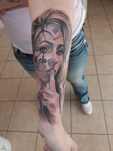 Explore blessing tattoo ideas, creative tattoo ideas in Hereford, available at Slow Pain Tattoo Body Art Studio