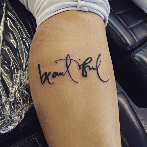 Explore forearm rose tattoo ideas, creative tattoo ideas in Redding, available at Caddy Daddys