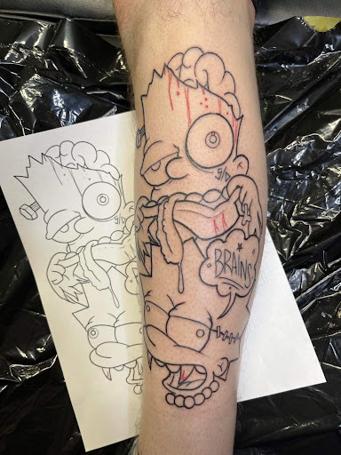 Explore skull and rose tattoo ideas, creative tattoo ideas in Bullhead City, available at Smoke and Dagger Tattoo