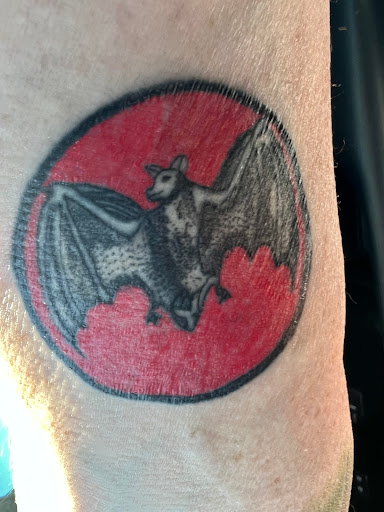 Explore mens inner bicep tattoo ideas, creative tattoo ideas in Pigeon Forge, available at Black Orchid Tattoo Studio