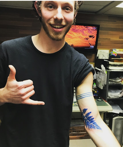 Explore roman numeral date tattoo ideas, creative tattoo ideas in Milwaukee, available at Bay Street Tattoo Co.