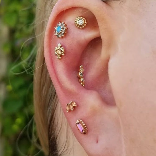 Explore cross sleeve tattoo ideas, creative tattoo ideas in Laguna Beach, available at Laguna Gold