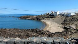 Photo de Playa el Poris avec petite baie