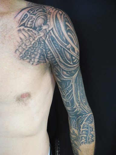 Explore tattoo ideas on ribs for men, creative tattoo ideas in Orange, available at Orange County Tattoos