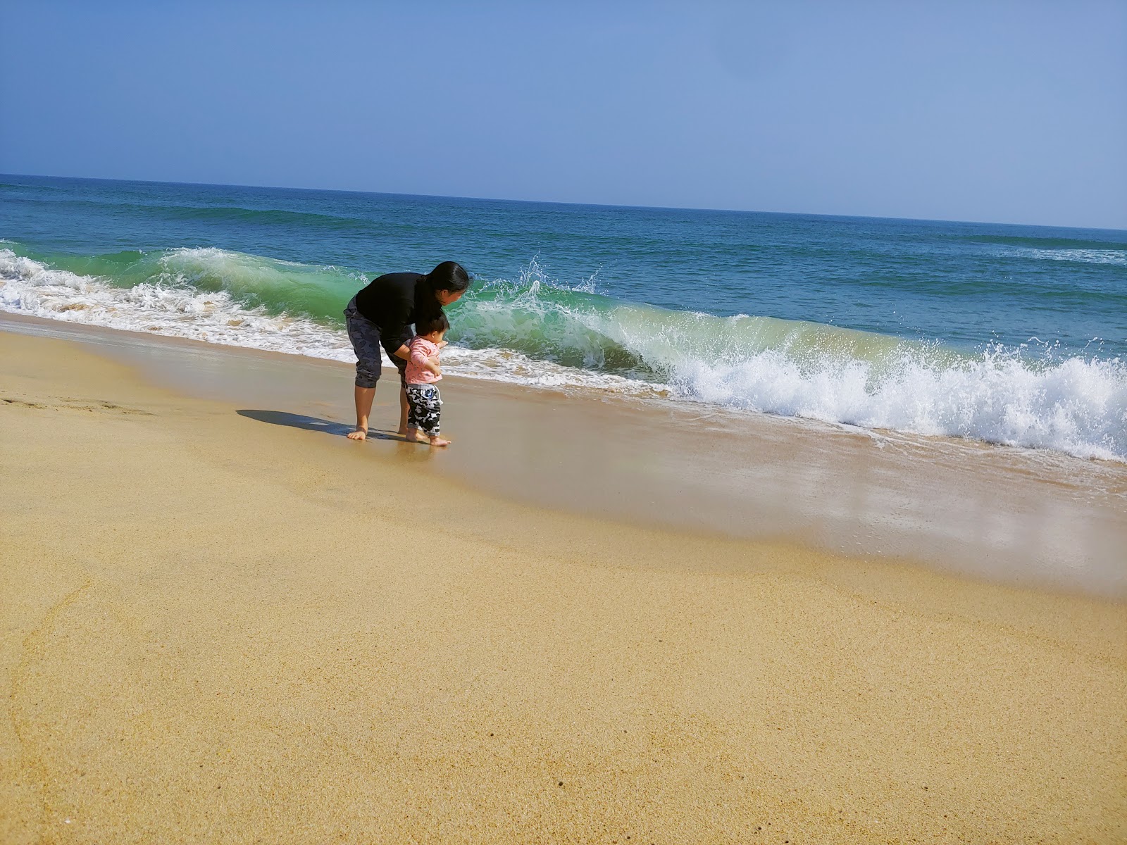 Φωτογραφία του Pho An Beach με επίπεδο καθαριότητας πολύ καθαρό