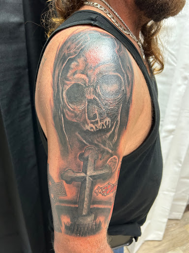 Explore tattoo on bicep ideas, creative tattoo ideas in Kingsland, available at These Colors Dont Run Tattoo & Piercing